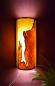 Preview: W105 Wandlampe – Ein Unikat aus Olivenholz und Limbabaum Diese Wandlampe bietet nicht nur warmes Licht, sondern auch ein beeindruckendes Design, das jedem Raum Charakter verleiht.